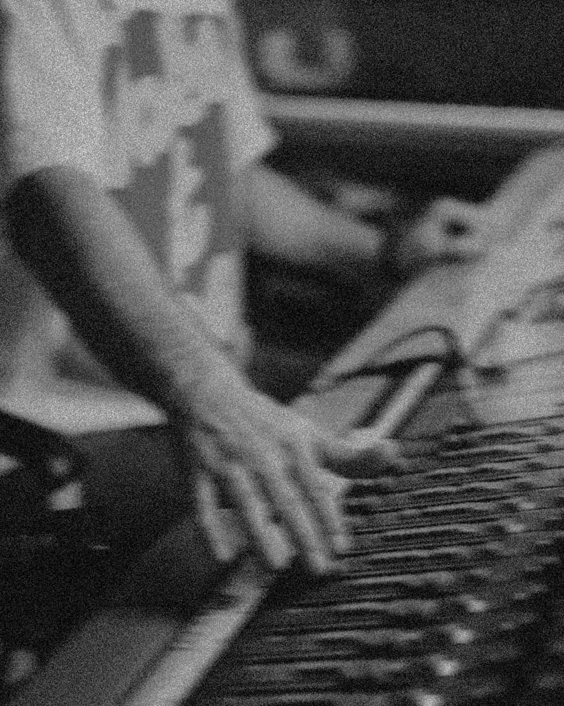 A producer shaping a track in the studio